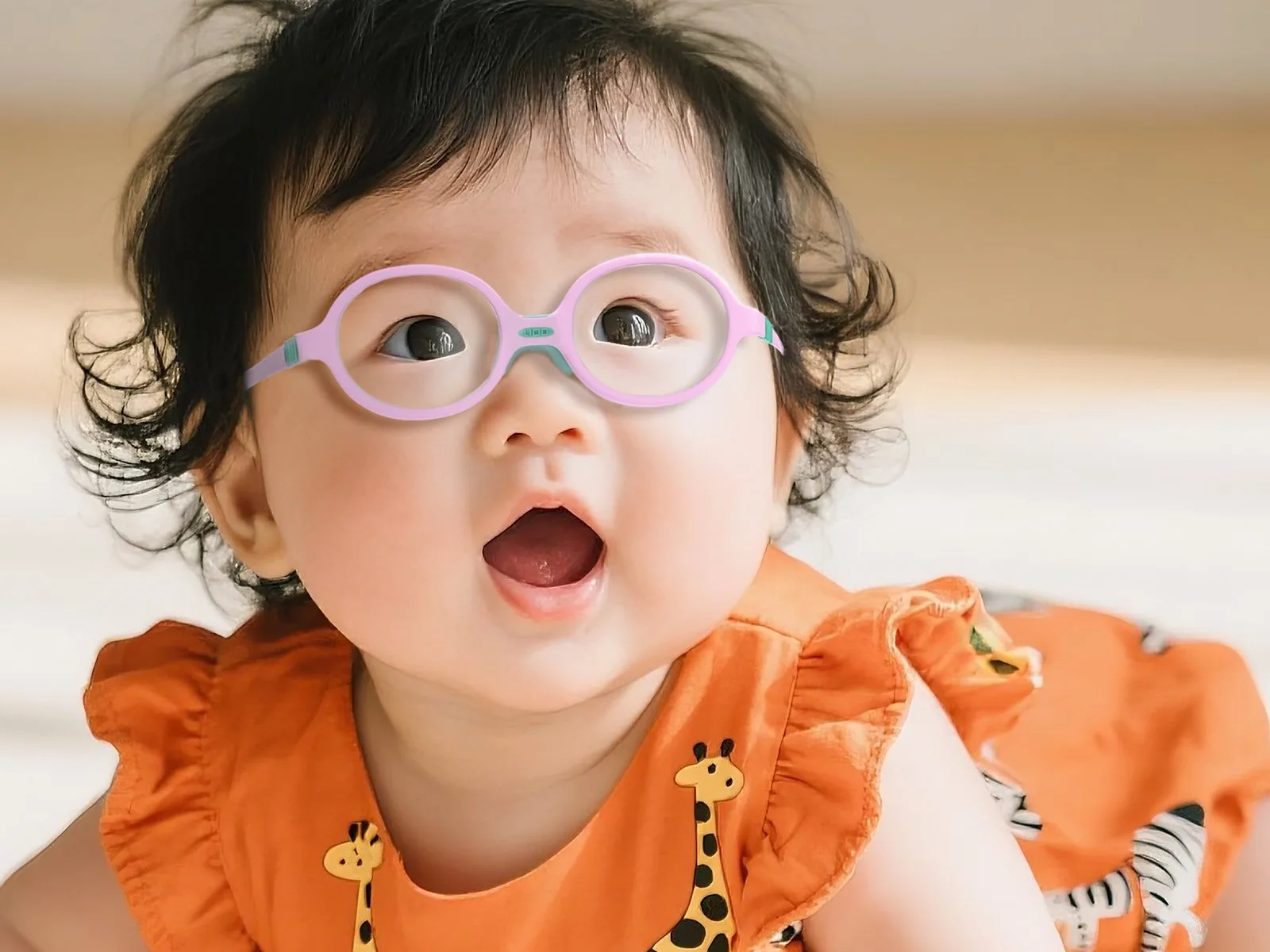 Baby wearing a lilac LIPO TONG frame