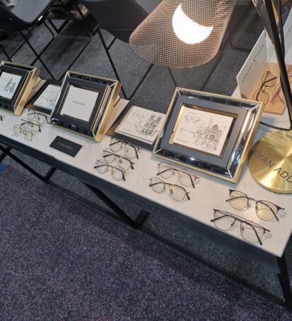 OMEGA19 ASIA CONTACTS 1 RYAN ADDA BOOTH FRAME
